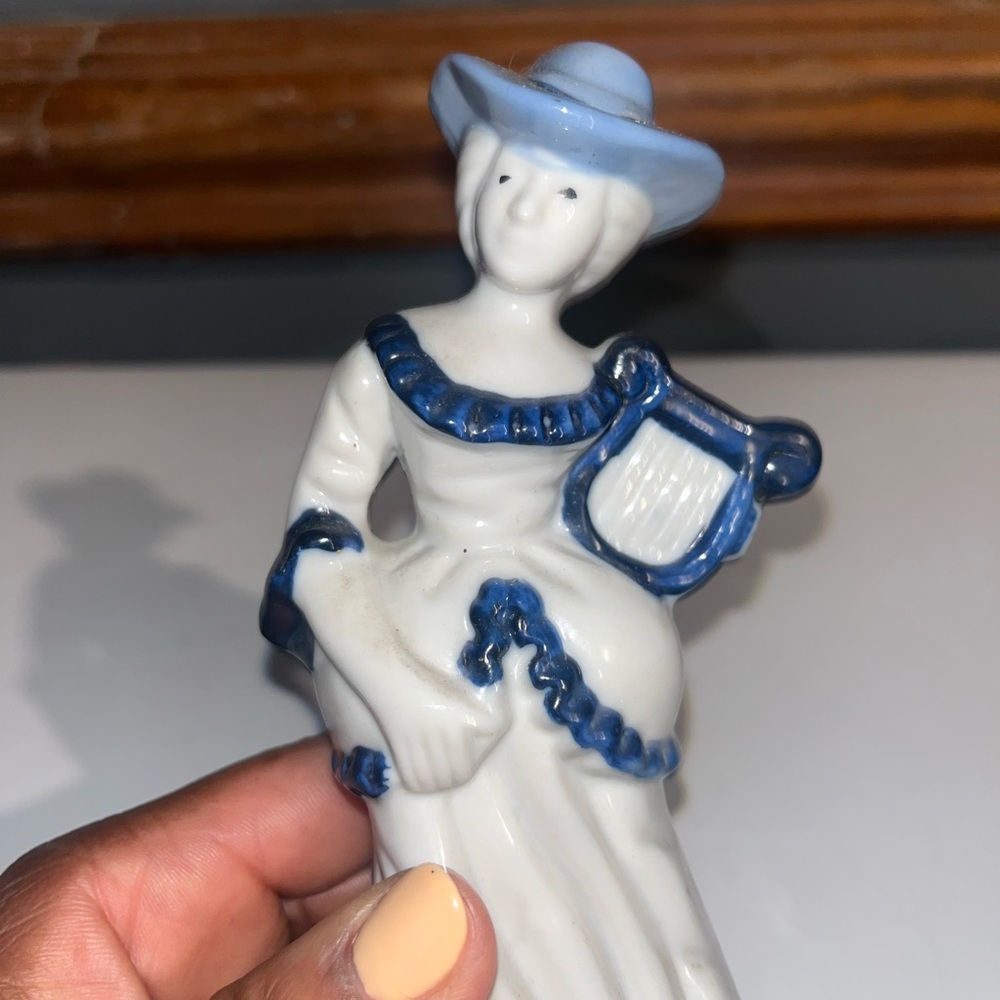 5/$10. Lady figurine